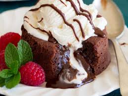 Molten Chocolate Lata Cake- Chocolate Cake with
 Chocolate Center, Served with Vanilla Ice Cream and
 Strawberry Coulis