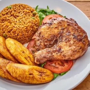 Nigerian Jollof Rice, Fried Rice or White Rice, Served with
 Choice Of Fish, Goat Meat Chicken, Beef, Turkey and Fried
 Plantain or Coleslaw