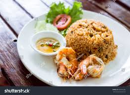 SEAFOOD FRIED RICE - Specially made rice served with
 shrimps/prawns and protein of choice.